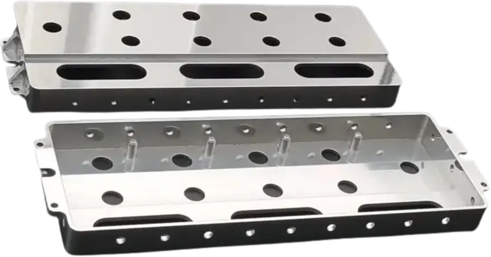 CNC machined aluminum mounting plates with bolt patterns.