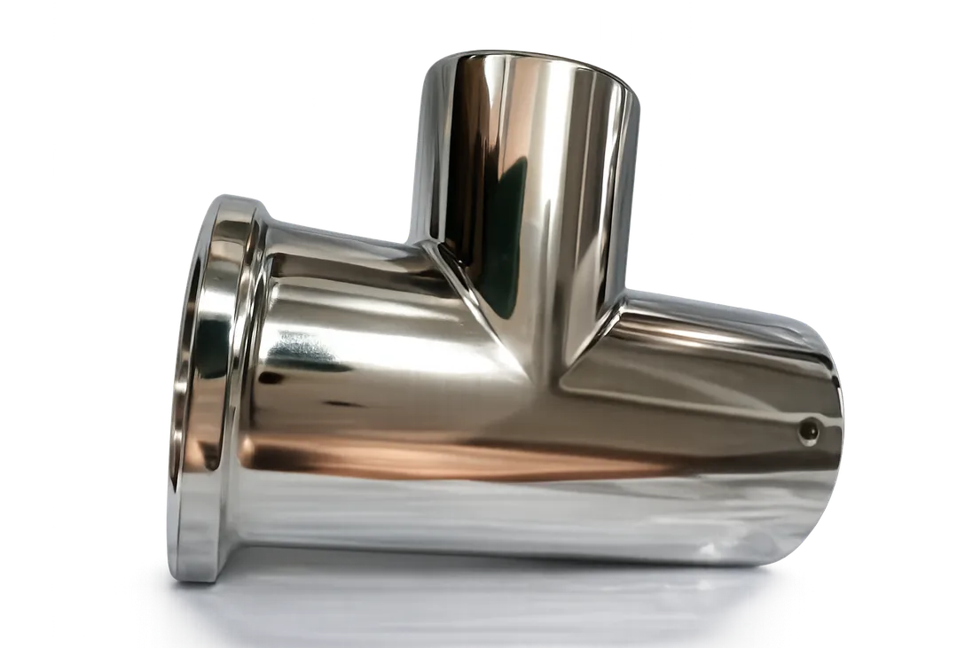 Electroless nickel plated stainless steel tee fitting with a bright, even finish.
