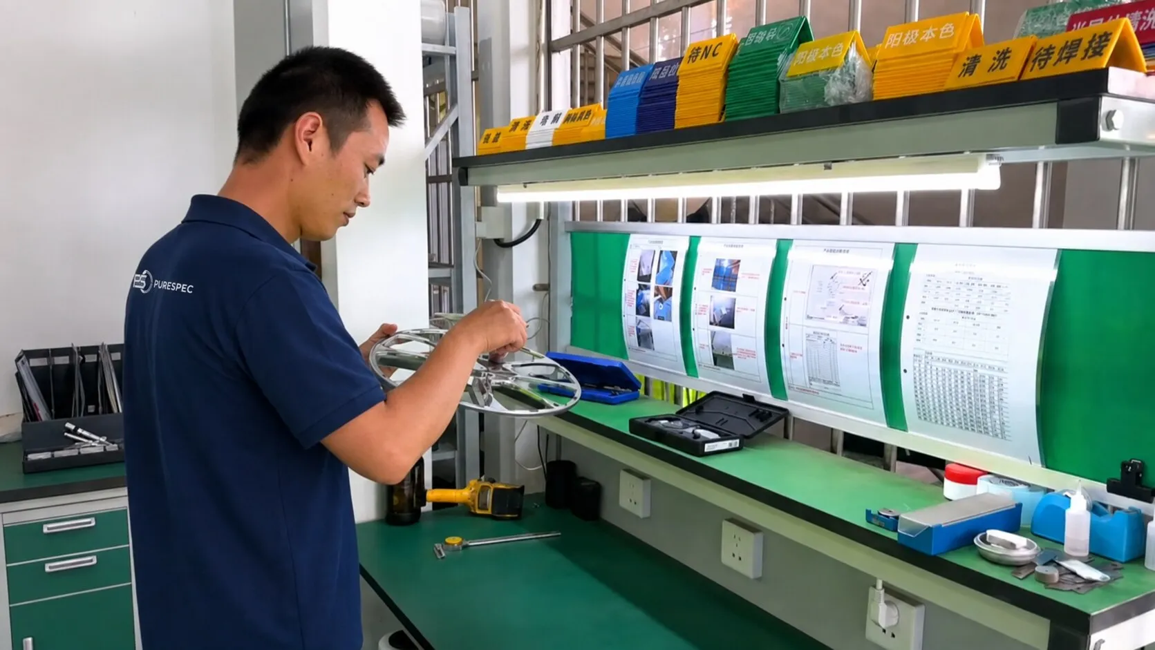 PURESPEC inspector checking a machined ring against the printed specification at a quality bench.