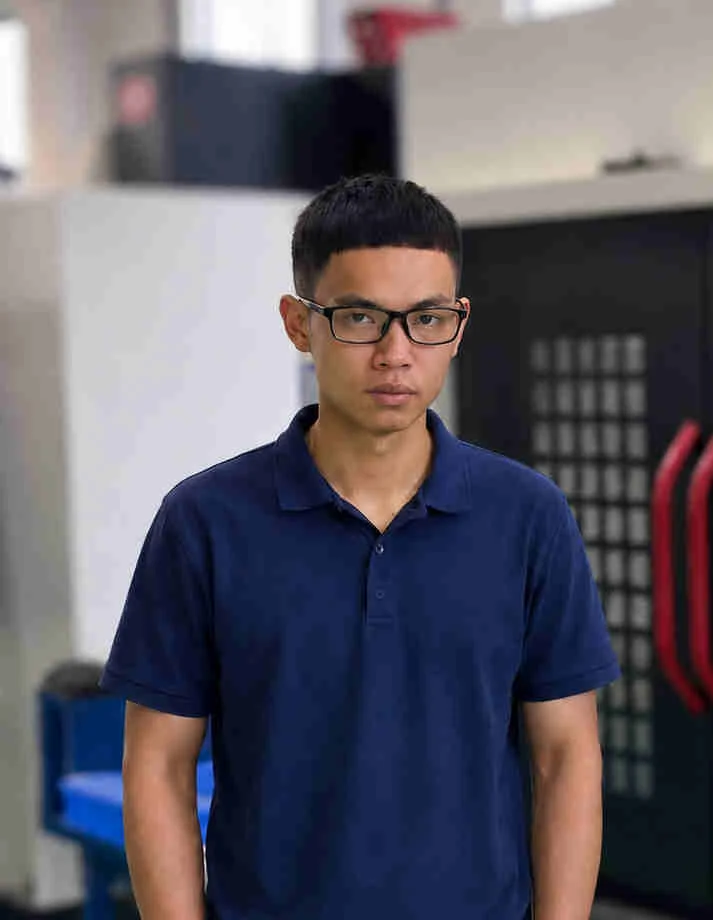 Haoran, Manufacturing Operations Manager, in the PURESPEC workshop.