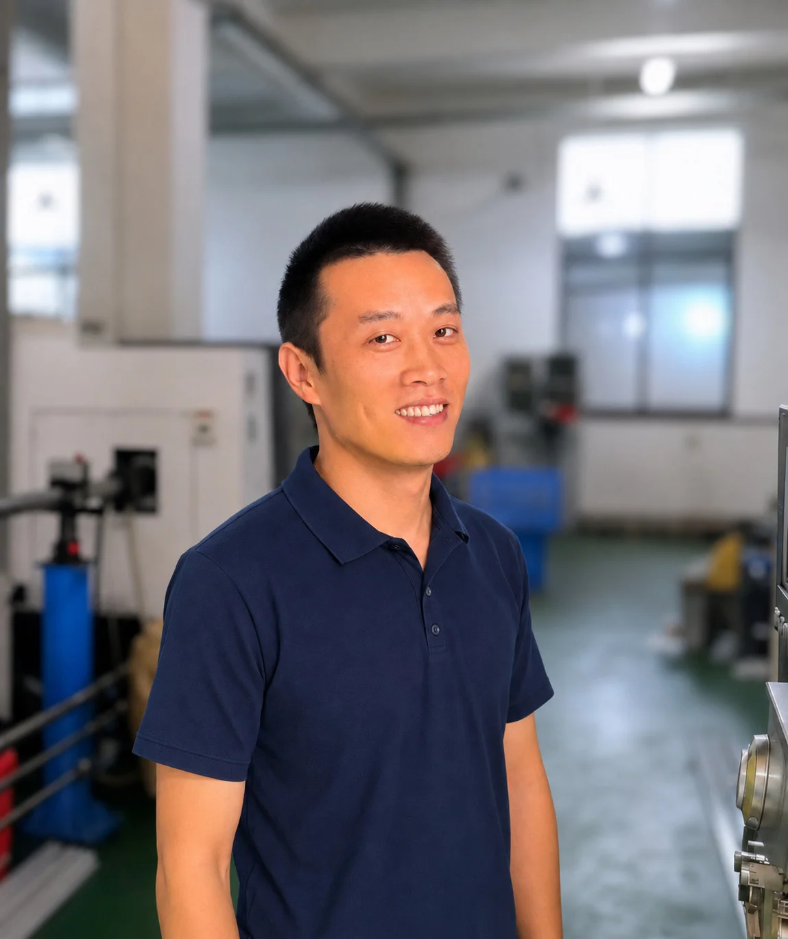 Jianping, Quality Manager, in the PURESPEC workshop.
