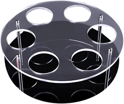 Machined polycarbonate disc with a circular hole pattern.