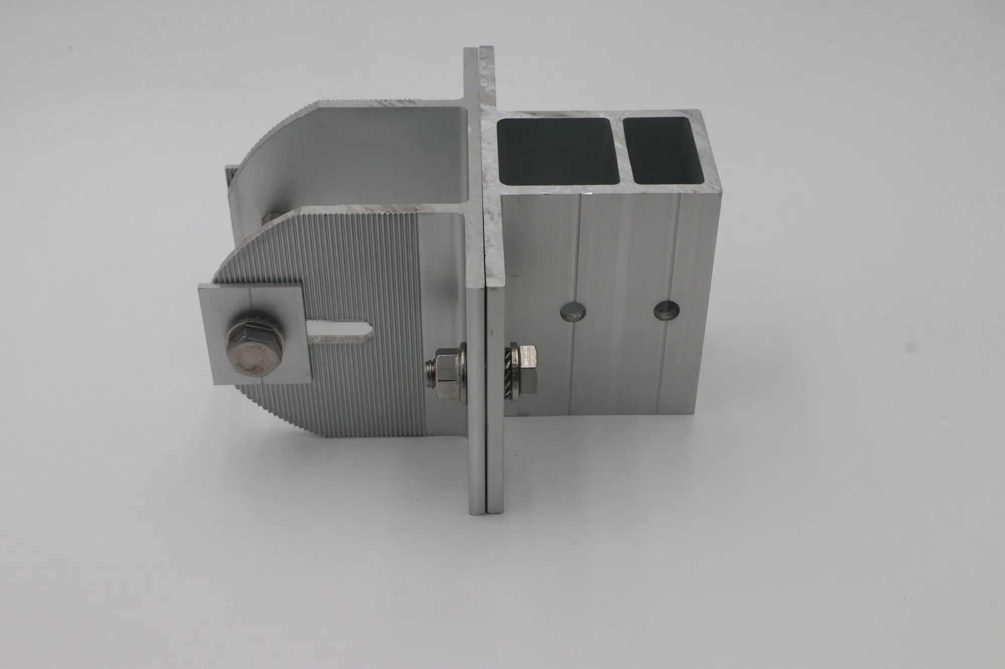 Aluminum mounting clamp assembly with machined profile sections and stainless fasteners fitted