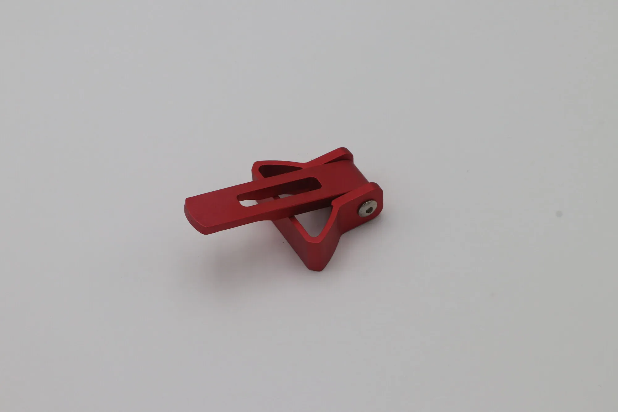 Red anodized machined aluminum toggle clamp lever with a slotted body