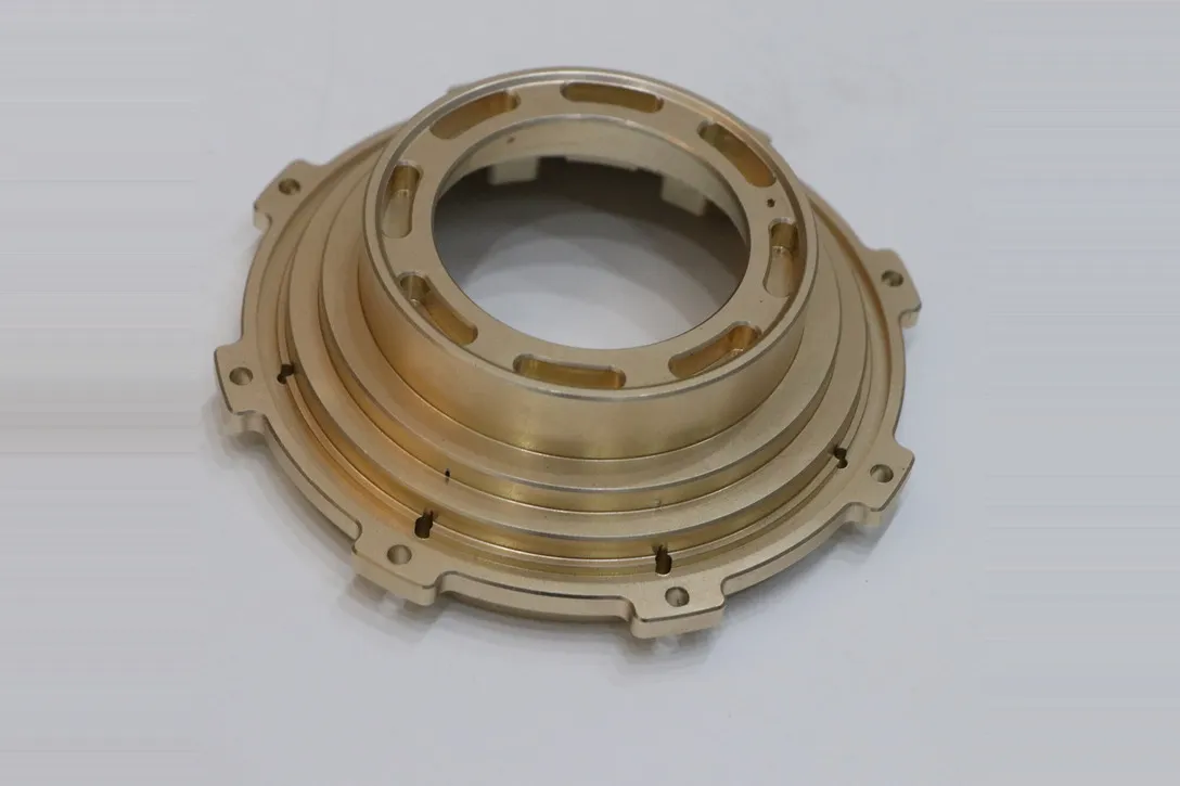 Large machined brass bearing and seal housing with concentric sealing lands