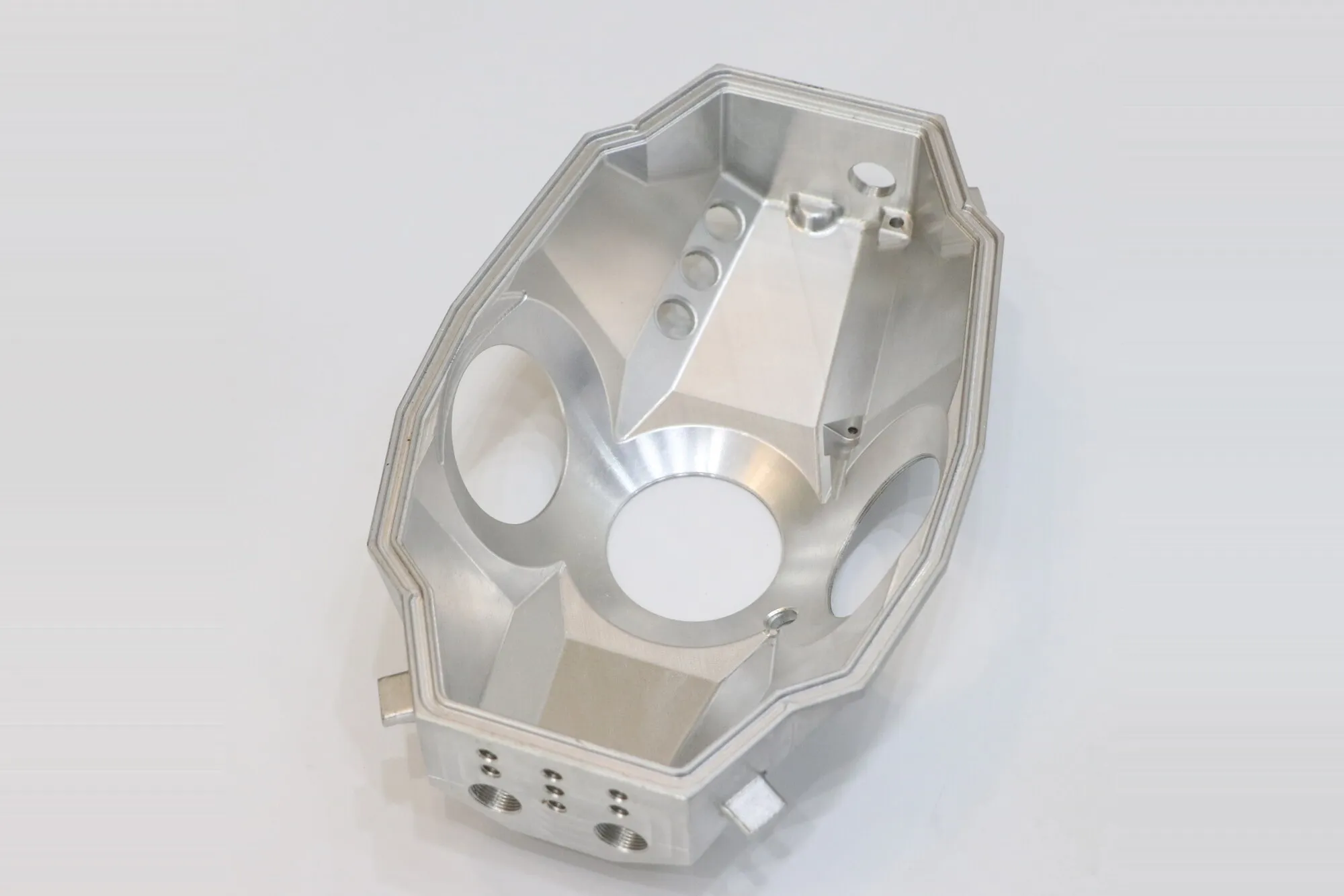 Large five-axis CNC milled aluminum housing with compound pockets and bored seats
