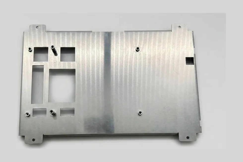Structural sheet metal frame chassis with cutouts.