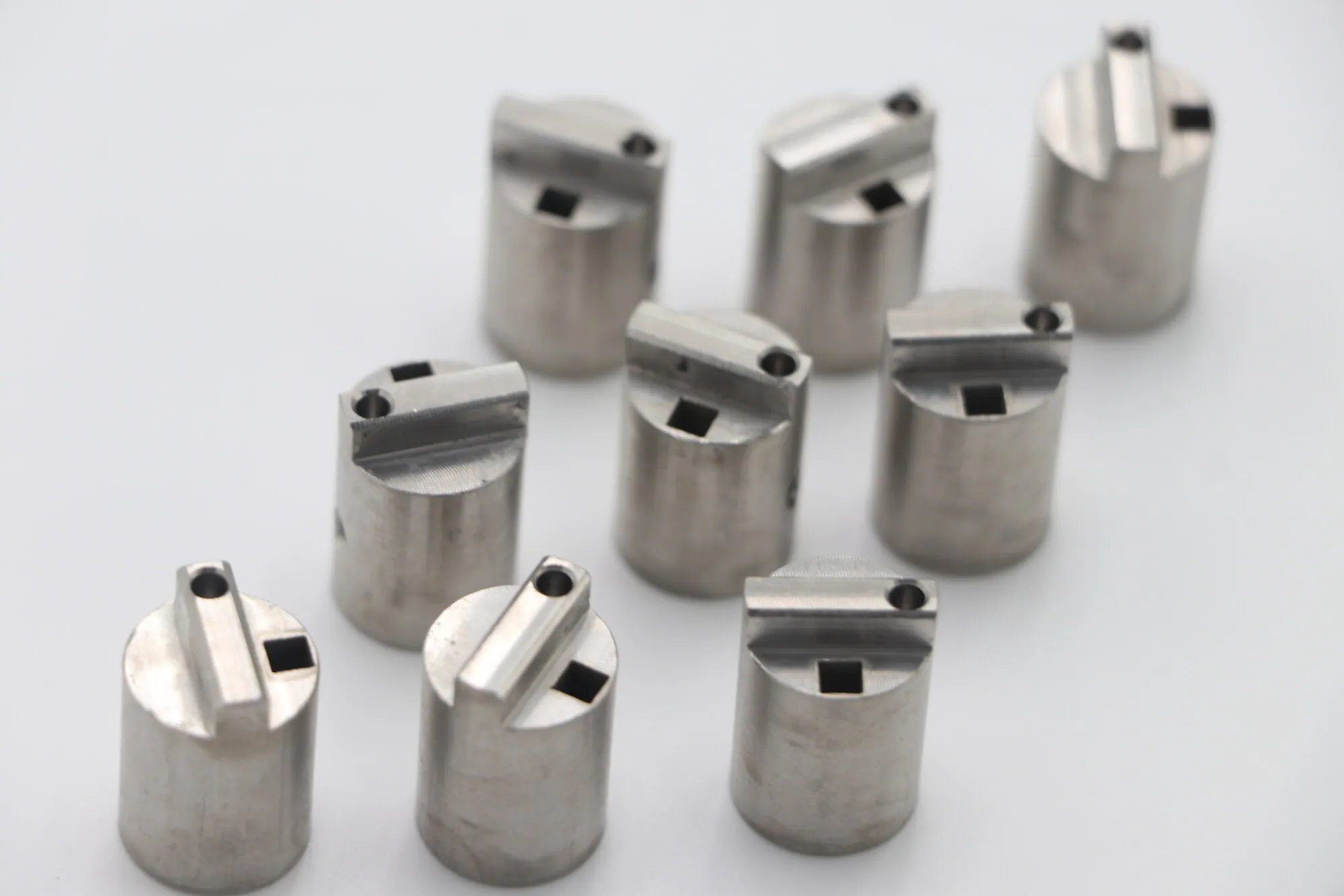 Production batch of CNC machined stainless steel valve cages
