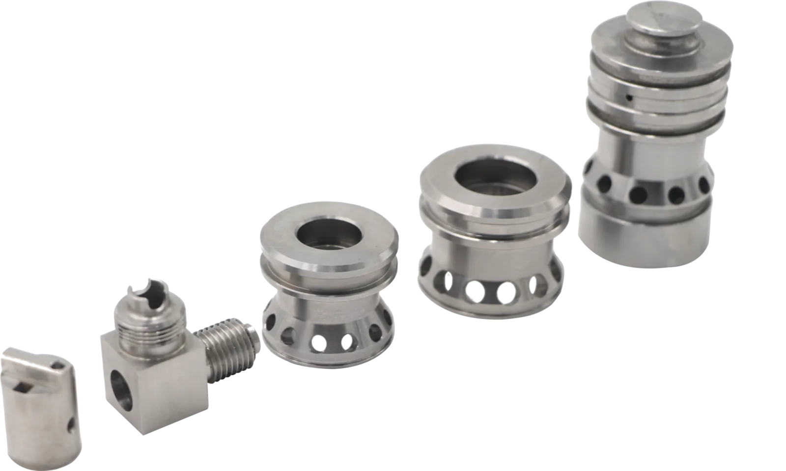 Set of precision CNC turned stainless steel valve spools with cross-drilled ports and machined lands
