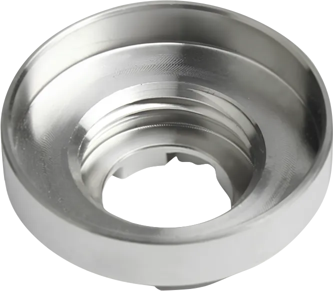 CNC machined titanium recessed housing with a threaded bore.